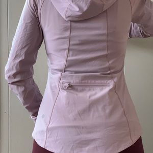 Lululemon light weight jack with hood. Packs into back pocket.